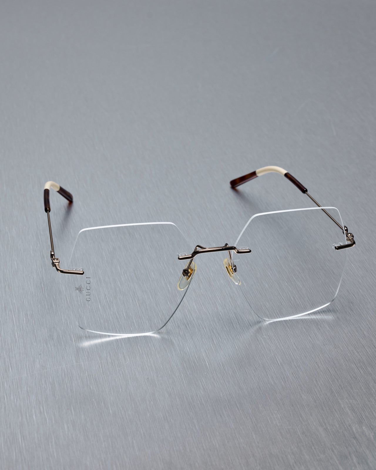 Gucci Frameless clear lense glasses GG0683O