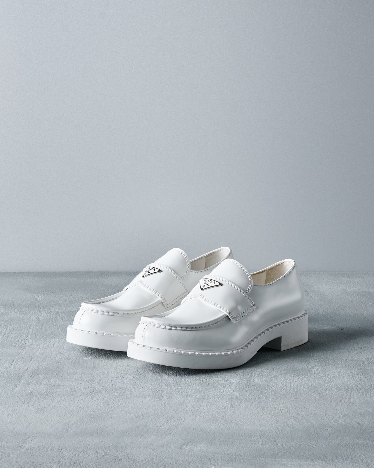 Prada White Chocolate patent leather loafers