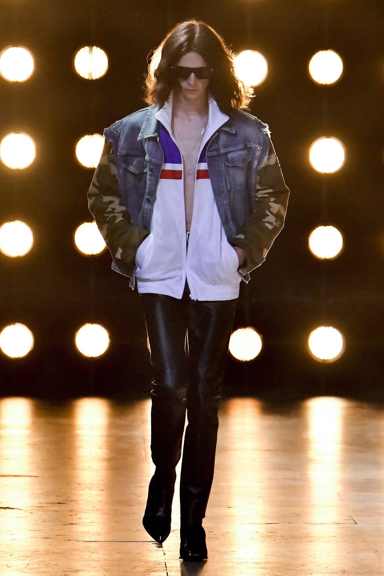 Colour-blocked Celine jacket with blue, white, and red stripes on a mannequin against a white background