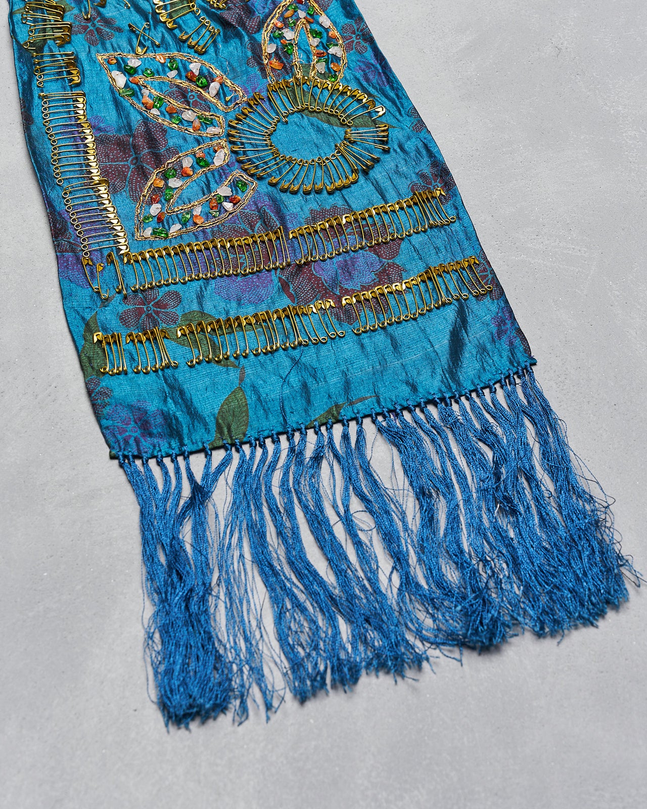 Blue Dries Van Noten scarf with intricate gold embroidery and floral patterns, featuring fringe along the edge