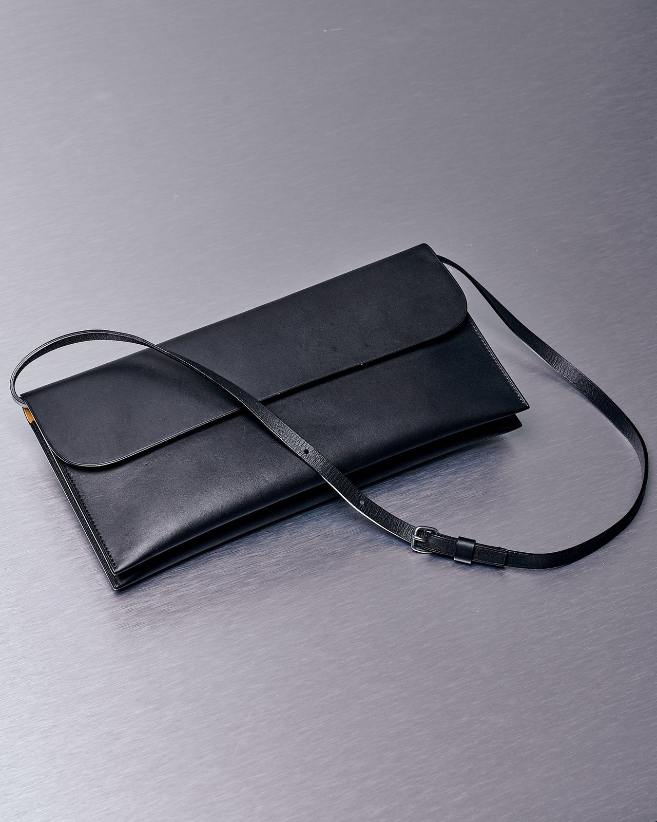 Isaac Reina N°785 Bis Round Flap Clutch with strap