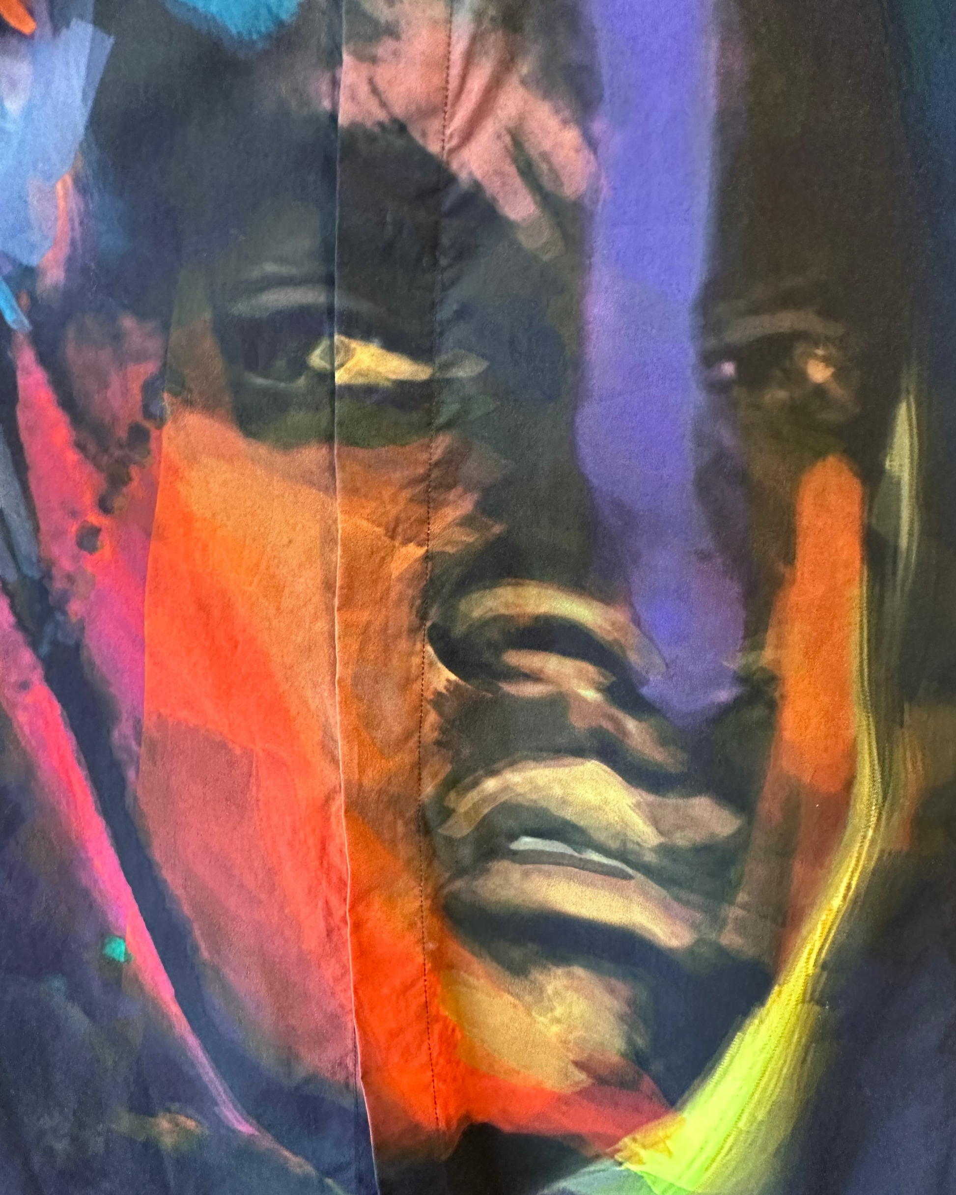 Abstract Givenchy art shirt with vibrant colors and a face-like shape