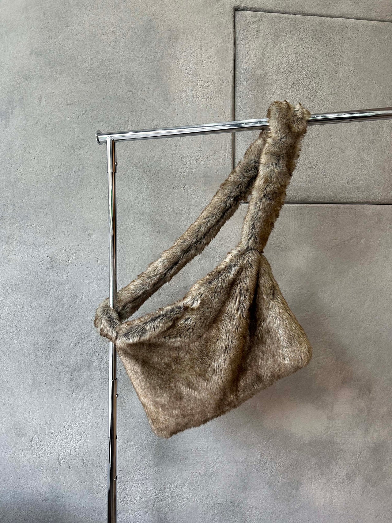 Amomento Faux fur cross body bag