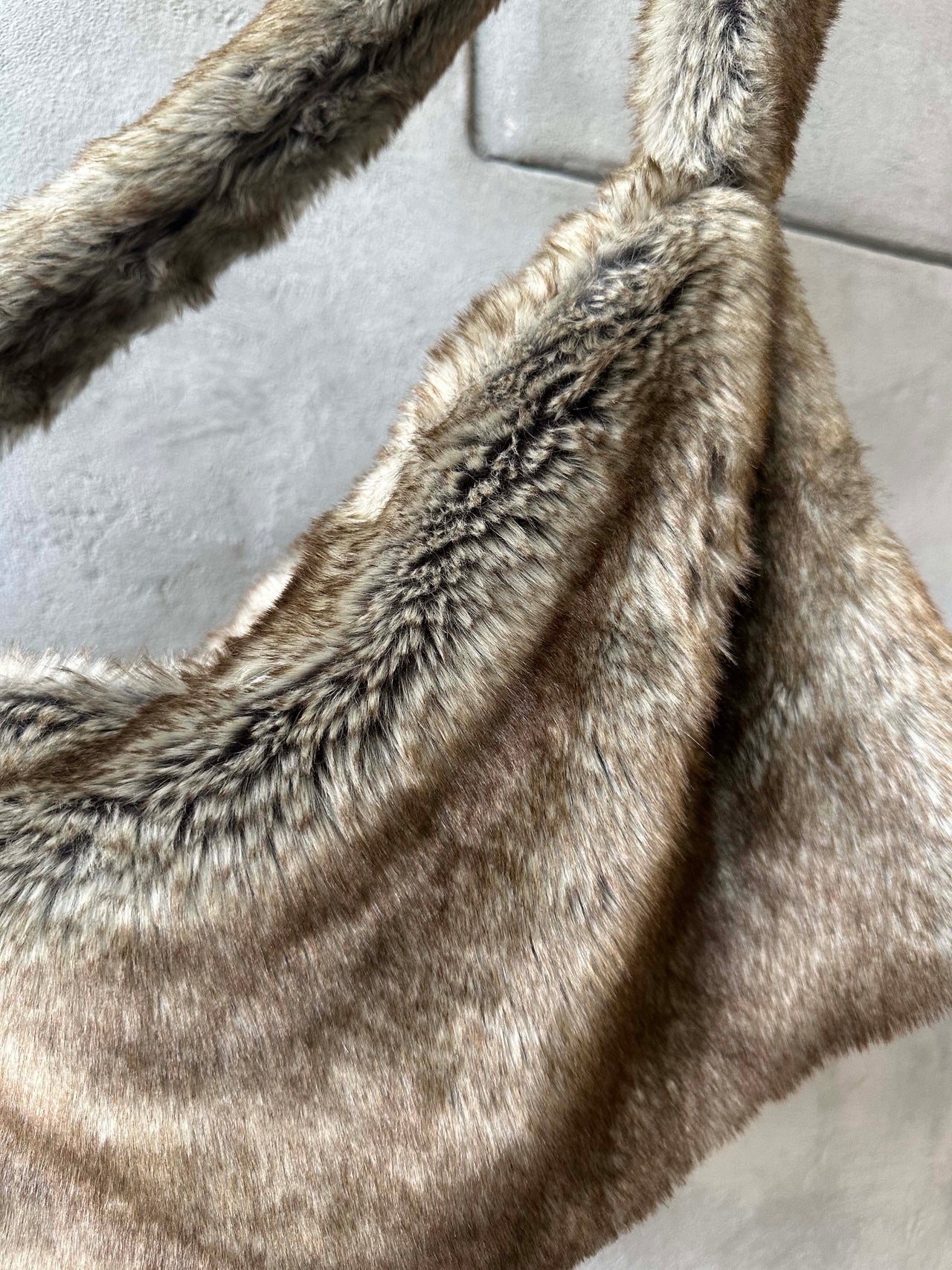 Amomento Faux fur cross body bag