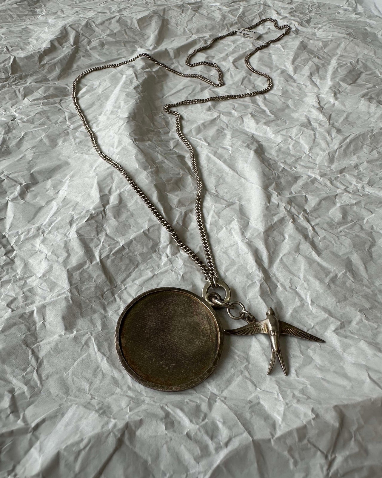 Ann Demeulemeester Swallow and hammered silver charm necklace