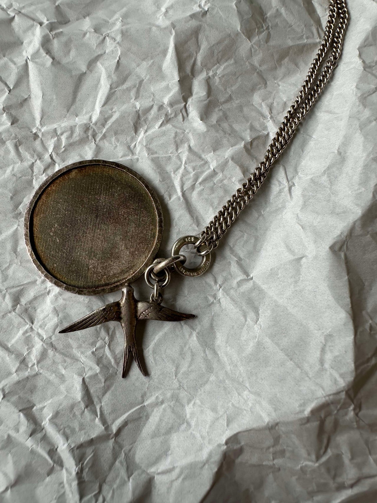Ann Demeulemeester Swallow and hammered silver charm necklace
