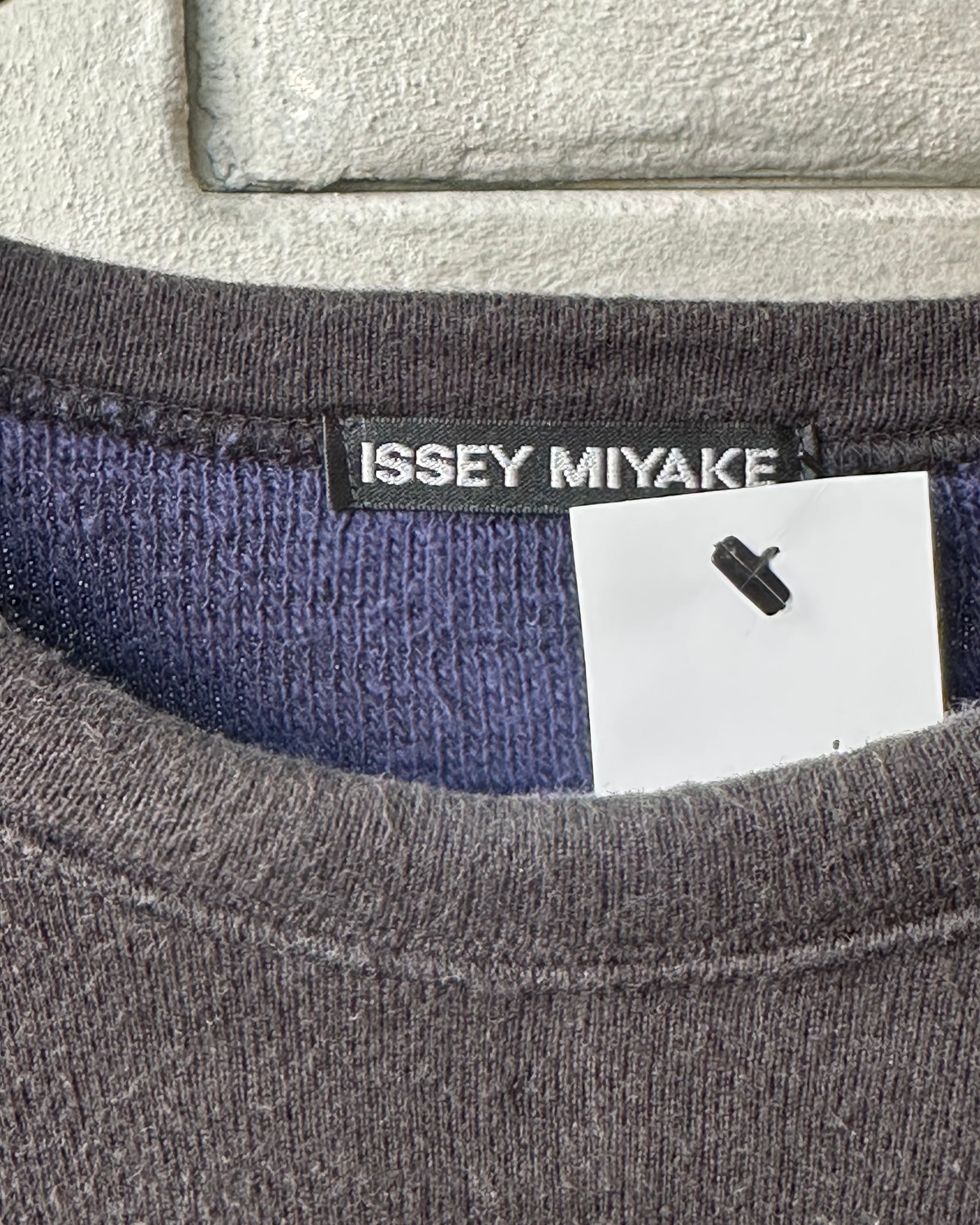 Close up of Issey Miyake label