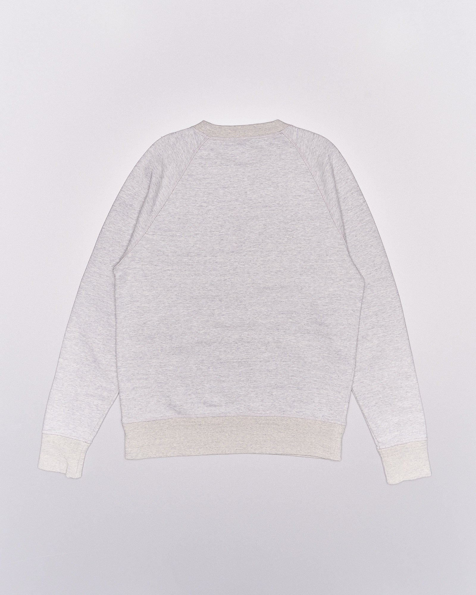 Back view of a light gray Louis Vuitton sweater on a plain white background. The sweater features raglan sleeves and ribbed cuffs and hem, conveying simplicity and comfort.