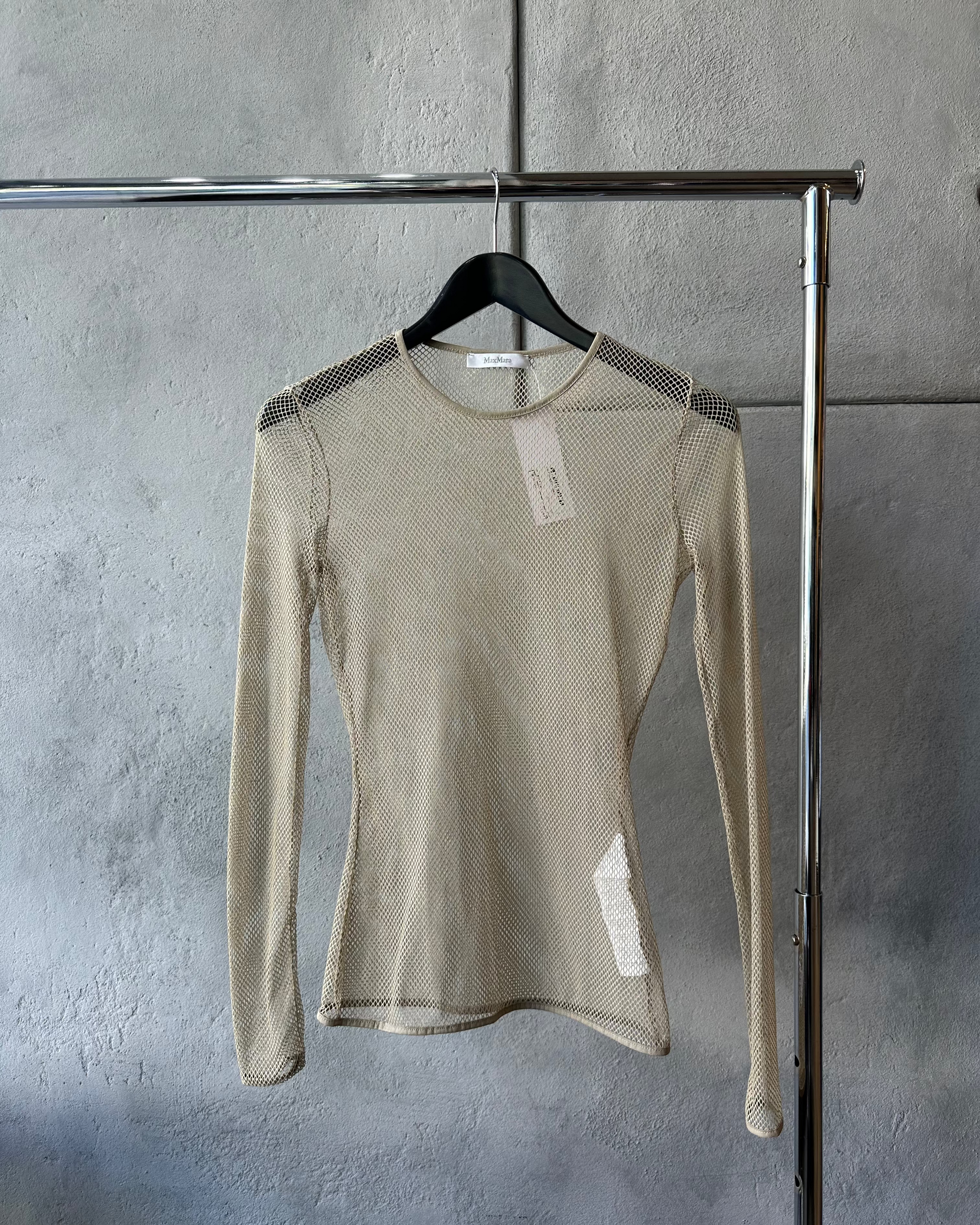 Beige long-sleeve Max Mara mesh top on a hanger against a gray wall