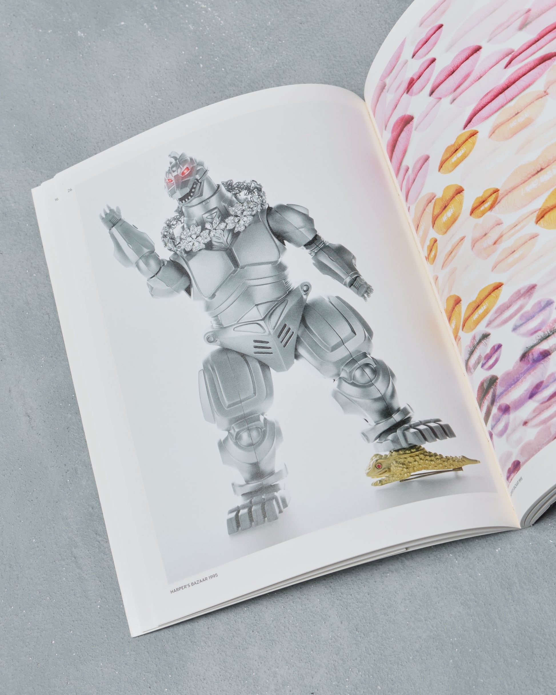 Open Ppaper Magazine with a robot illustration on a gray surface